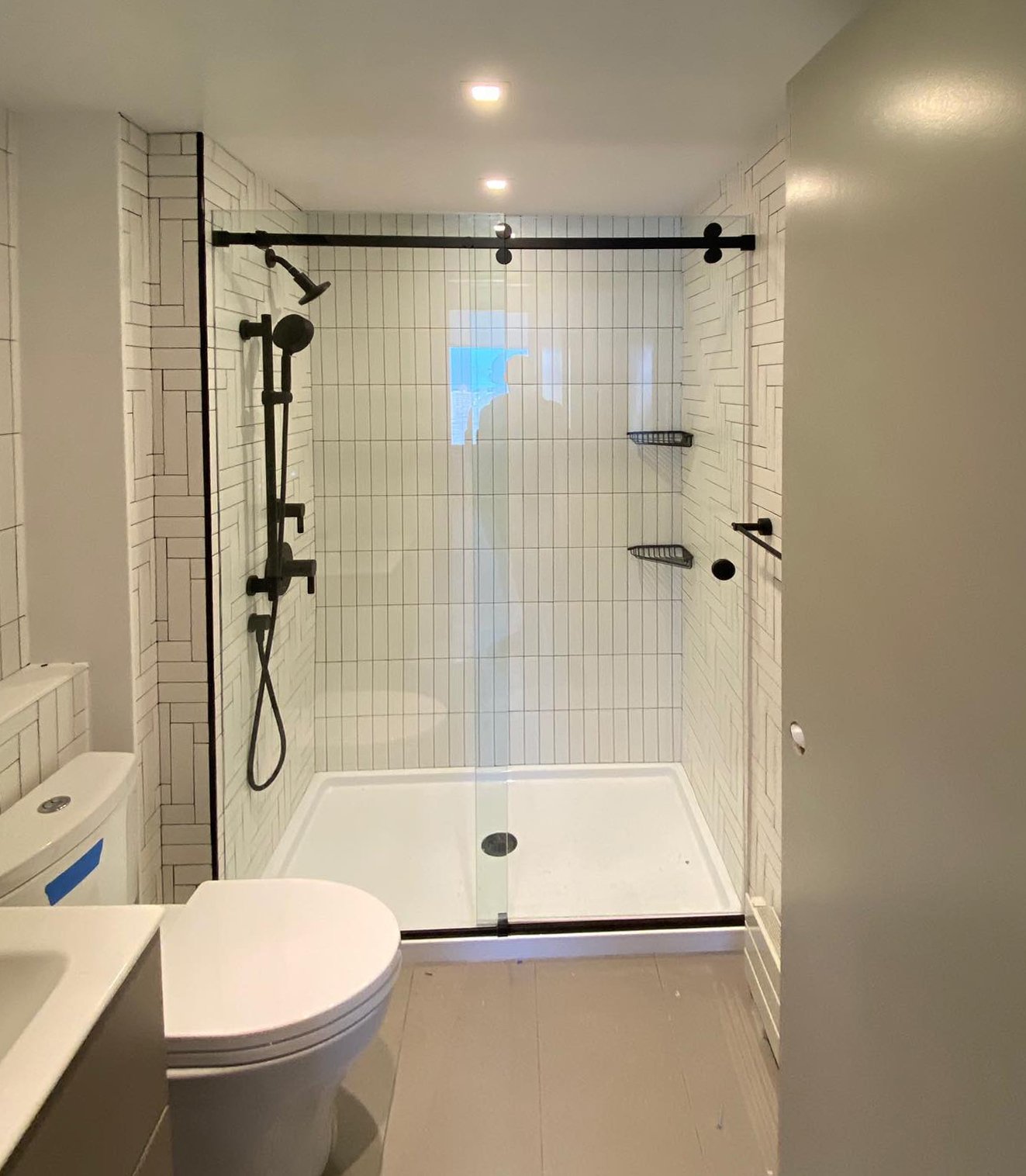 Custom frameless shower enclosure installation NYC